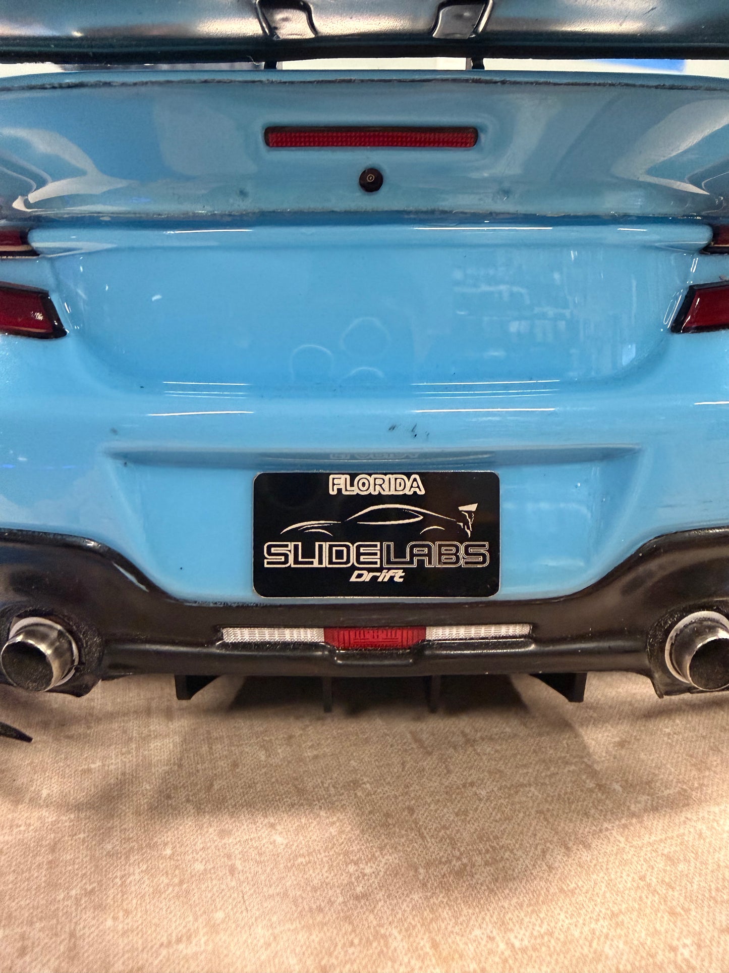 SLIDE LABS LICENSE PLATE
